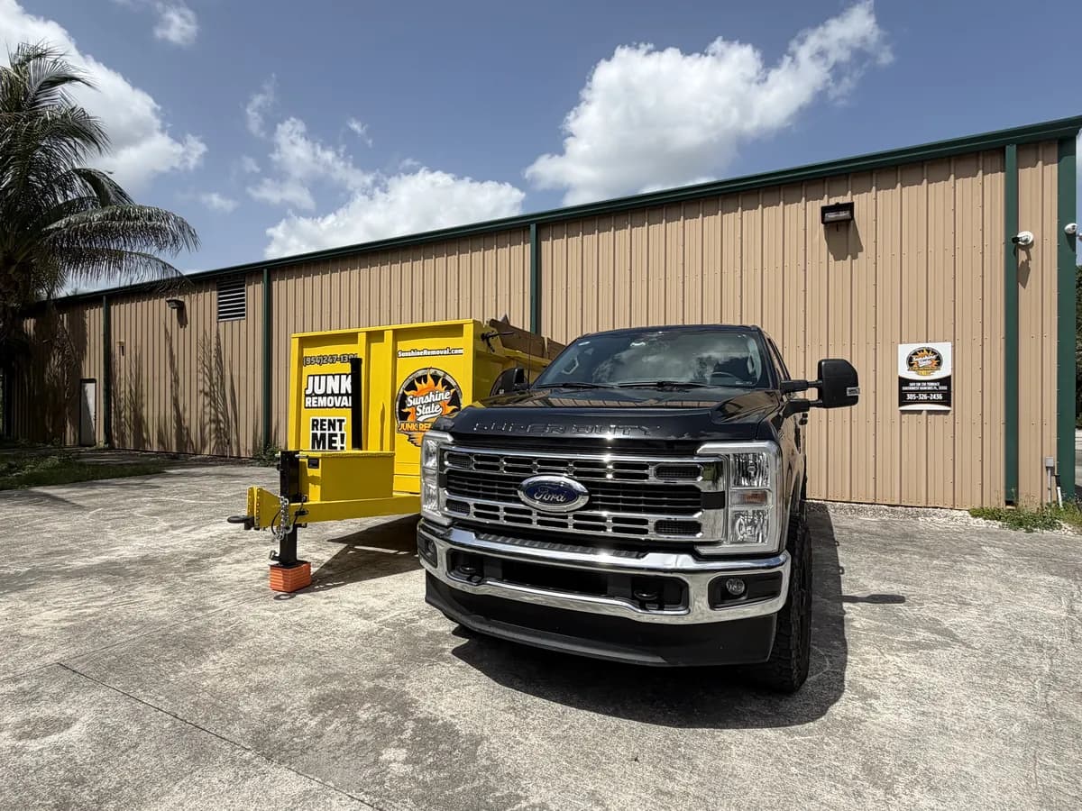 Sunshine State Junk Removal truck and dump trailer at the Southwest Ranches location